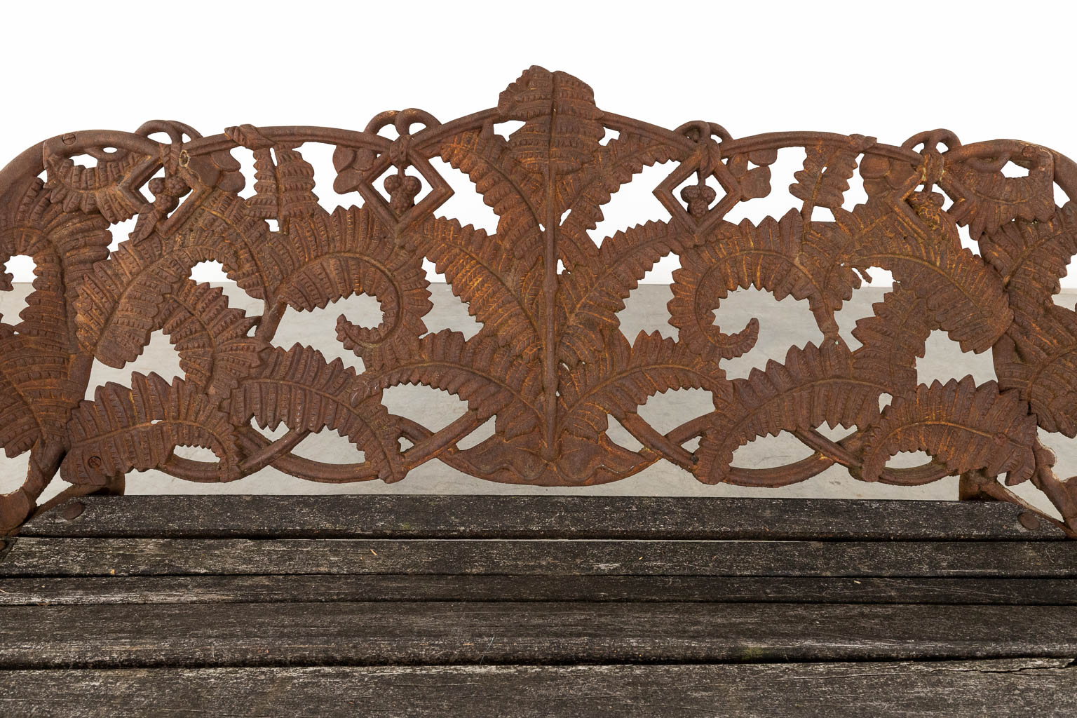 A cast-iron garden bench, decorated with fern leaves. 20th C. (D:53 x W:166 x H:88 cm)
