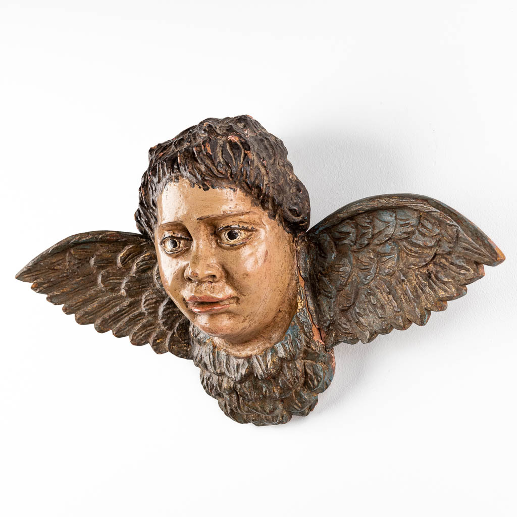 An antique wood sculpture of an angel, polychrome, 18th C. (W:61 x H:34 cm)