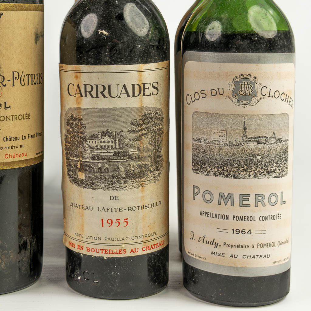A collection of vintage wine bottles, incl. 1 x Château La Fleur Petrus 1967. (H:30cm)