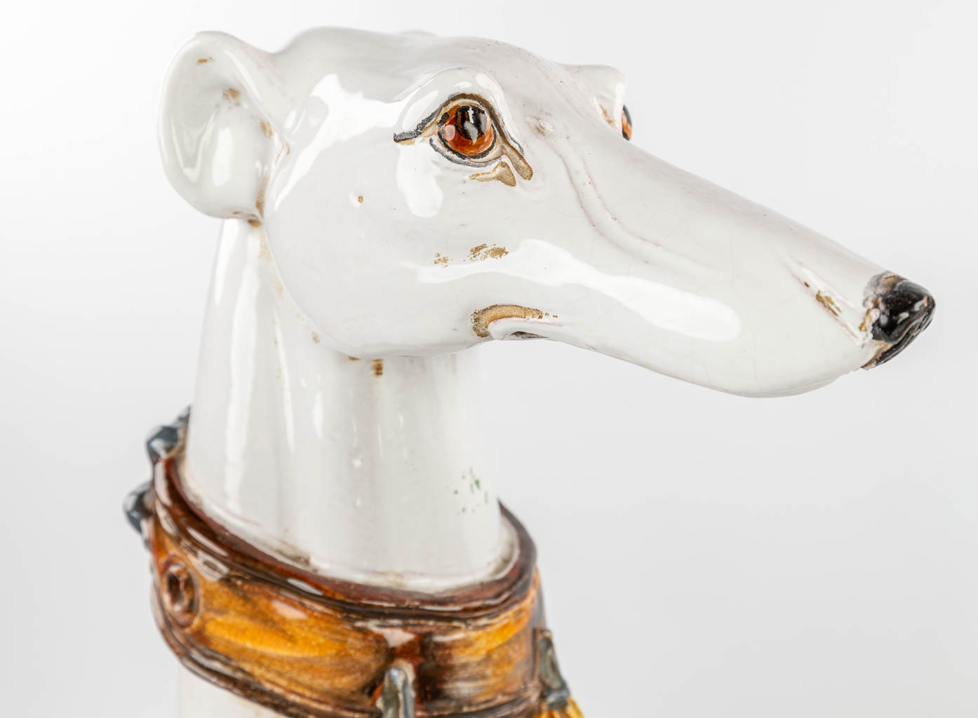 A pair of 2 mid-century greyhounds made of glazed terracotta, made in Italy. (H:67cm)