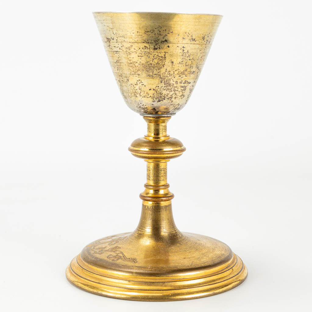 A gilt neogotich chalice, made of gold-plated brass.