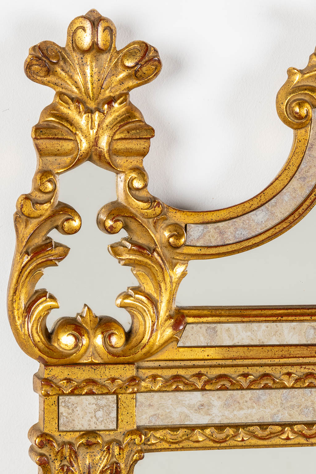 Deknudt, a gilt mirror in Louis XVI style. (W:60 x H:125 cm)