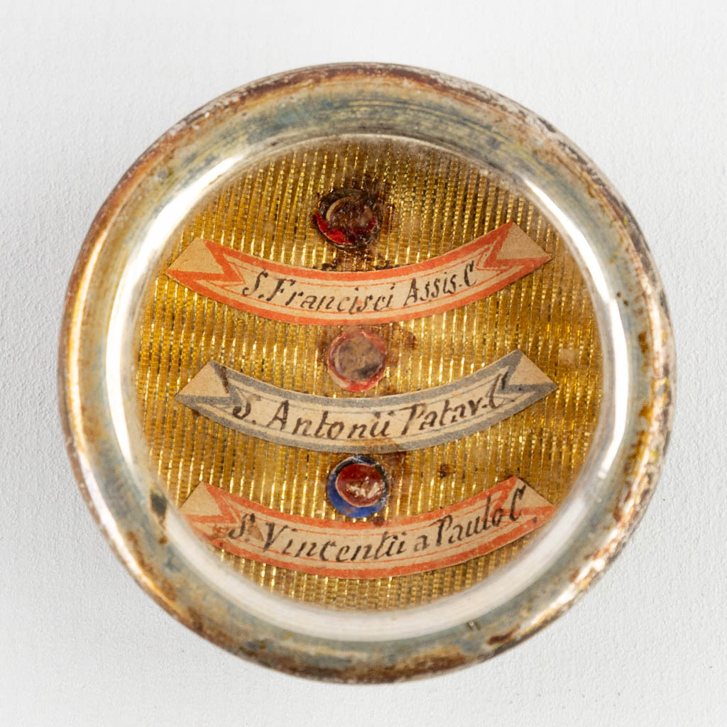 A sealed theca with a relic: de habitu Sancti Francisci Assisien, Ex Ossibus Sancti Antonii Patarini, et Sancti Vincentii a Pau