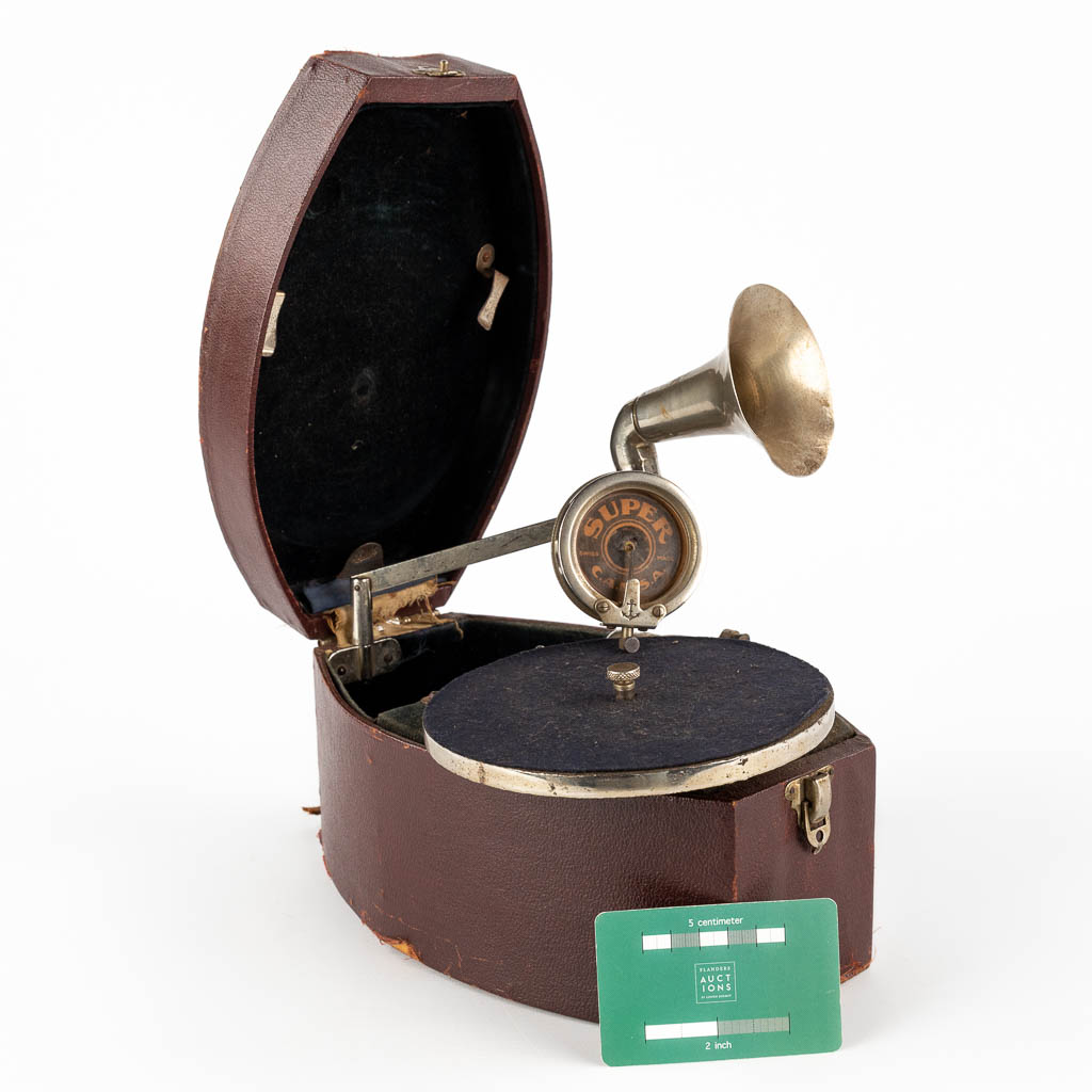 Pathé, a travellers grammophone. (D:17 x W:27 x H:13 cm)