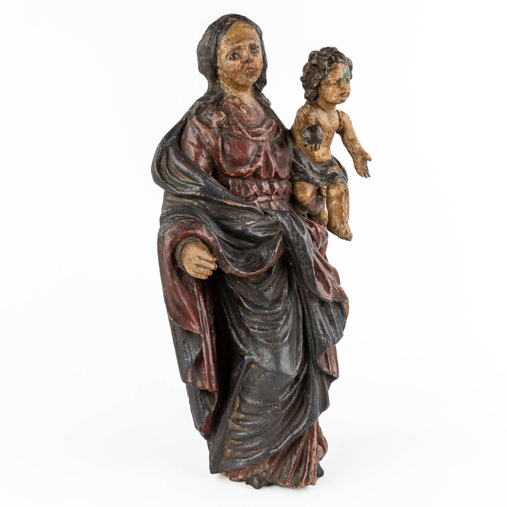 An antique figurine of Madonna with child, polychrome. 17th/18th C. (W:24 x H:46 cm)