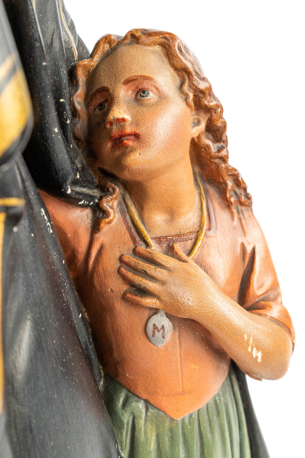 A statue made of patinated plaster of the holy 