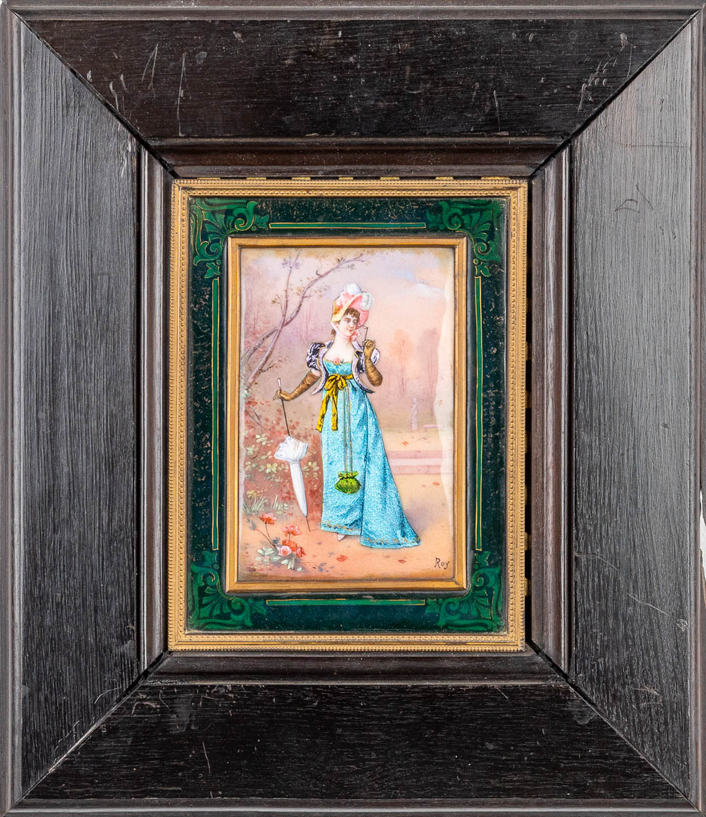 A pair of hand-painted enamel plaques mounted in ebonised wood frames, marked Roy. (H:15,5cm)