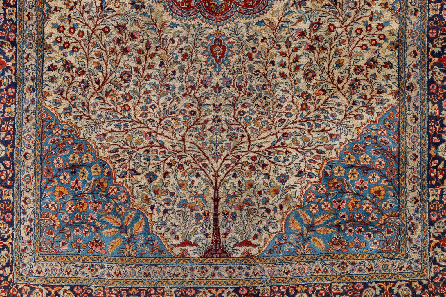 An Oriental hand-made carpet, flower decor, Tabriz. (L: 245 x W: 156 cm)
