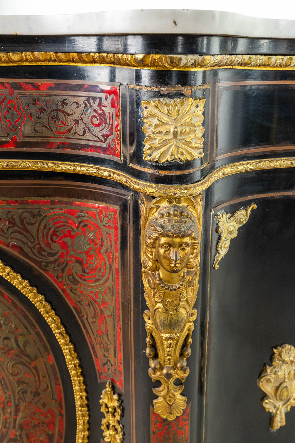 A cabinet with marble top made in Napoleon 3 style, mounted with bronze and finished with boulle tortoiseshell. (H:110cm)