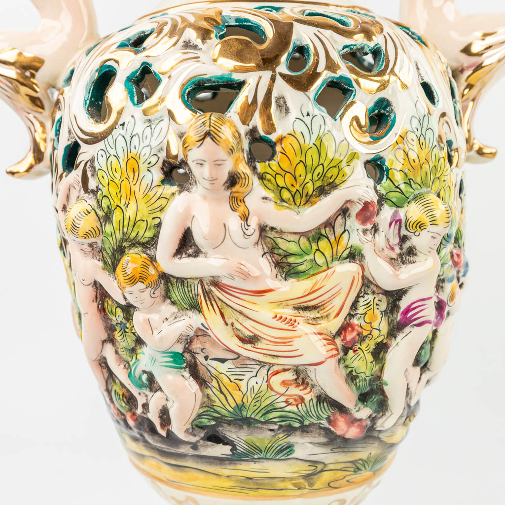 A collection of 6 vases and pots made of glazed faience by Capodimonte in Italy. (H:66cm)