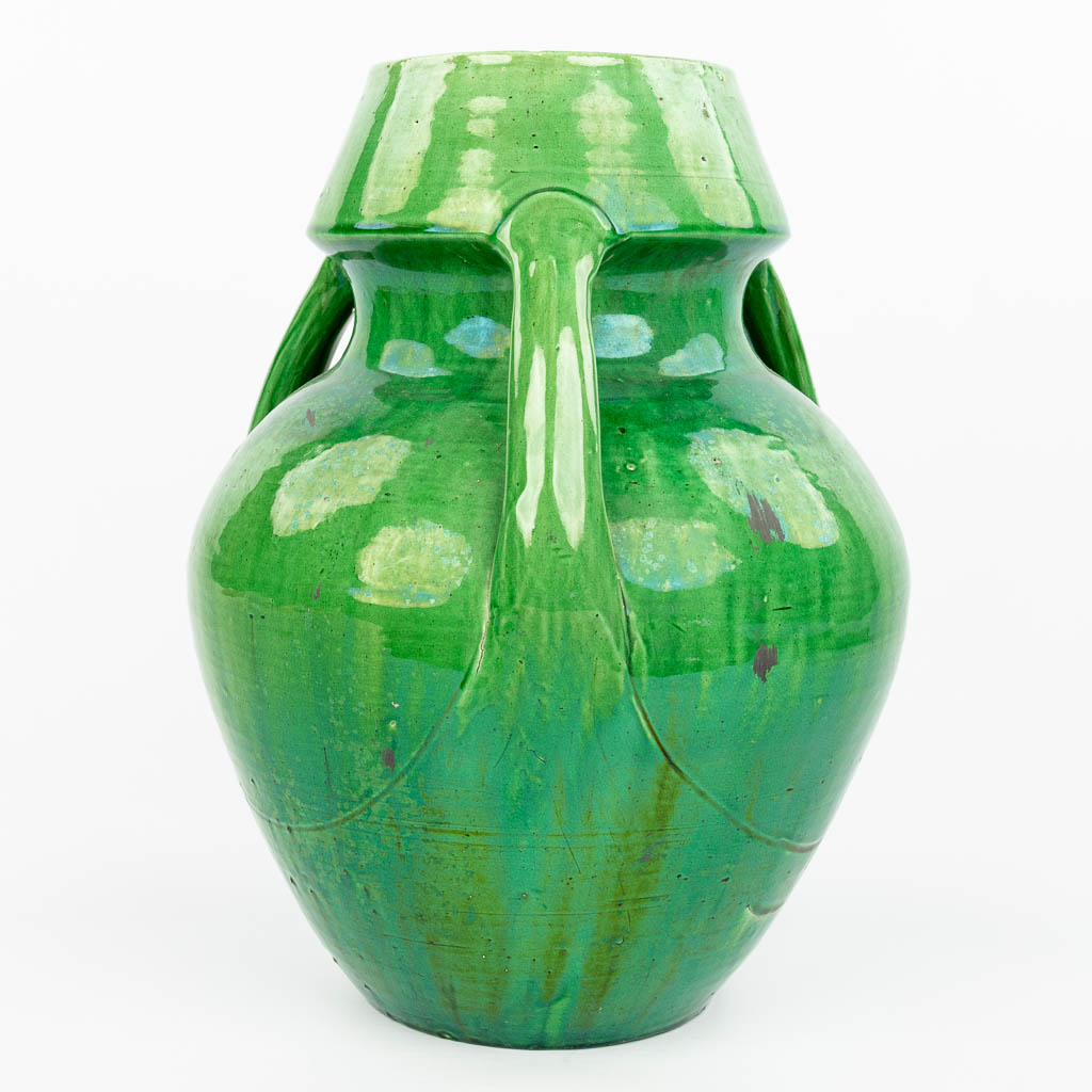 A large vase made of Flemish earthenware with green glaze. (H:39cm)