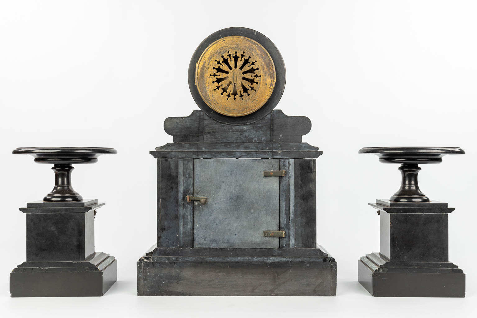 A three-piece garniture clock made of marble mounted with gilt bronze. (H:49cm)