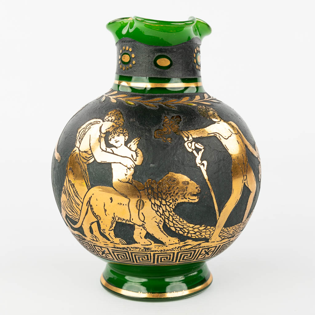 A vase made of green glass with an etched Roman scène. (H:19cm)