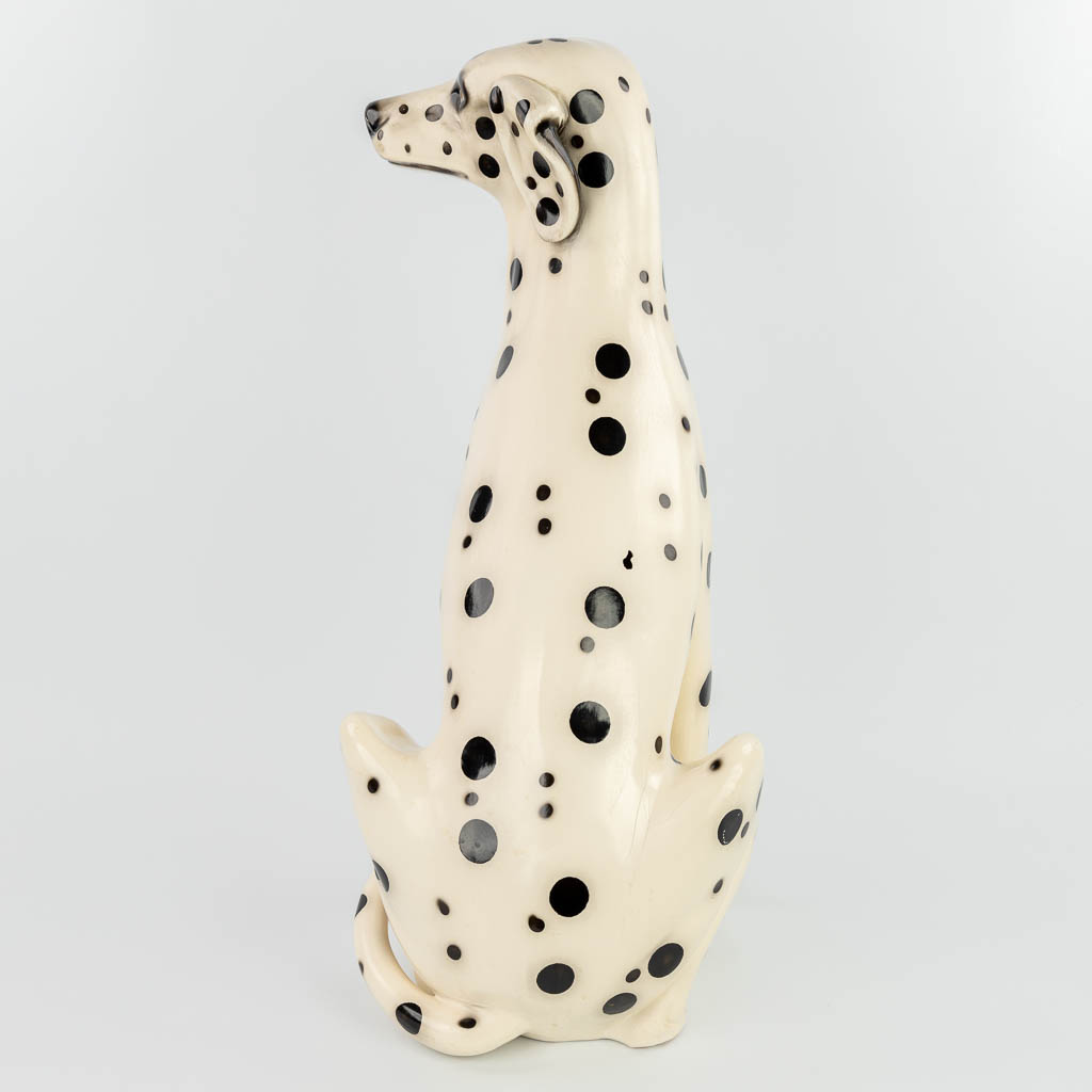 A mid-century statue of a Dalmatian made of glazed faience in Italy. (H:71cm)