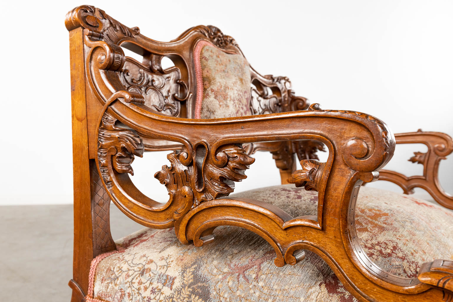An antique 3-piece salon suite, sculptured wood in Louis XV style. Circa 1900. (D:50 x W:70 x H:79 cm)
