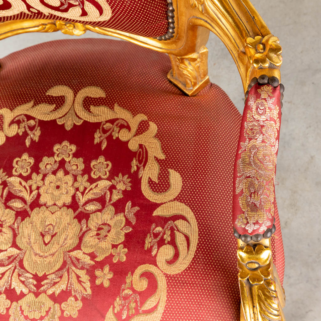 An armchair, gilt wood in Louis XV style. 20th C. (D:78 x W:67 x H:107 cm)