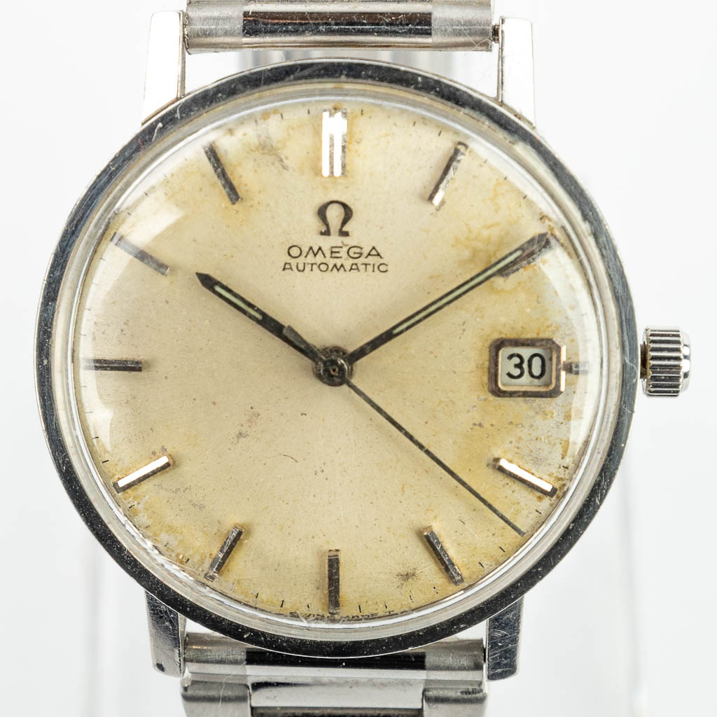 A vintage wristwatch marked Omega Automatic with central seconds hand. 