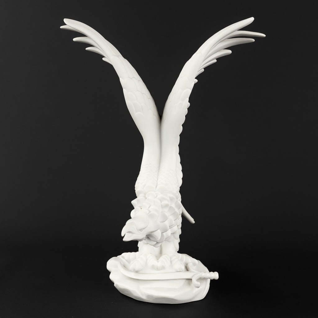 Herend, an eagle with sword figurine, bisque porcelain. (D:24 x W:23,5 x H:33 cm)