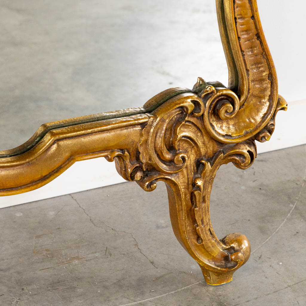 An Italian console table, mirror and wall lamps, gilt, Lodewijk XV stijl. (L:36 x W:131 x H:217 cm)