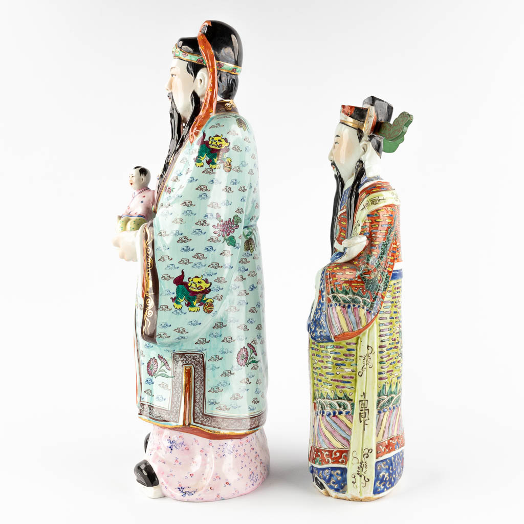 Four Chinese Famille Rose statues of Wise men. 20th C. (D:17 x W:23 x H:60 cm)