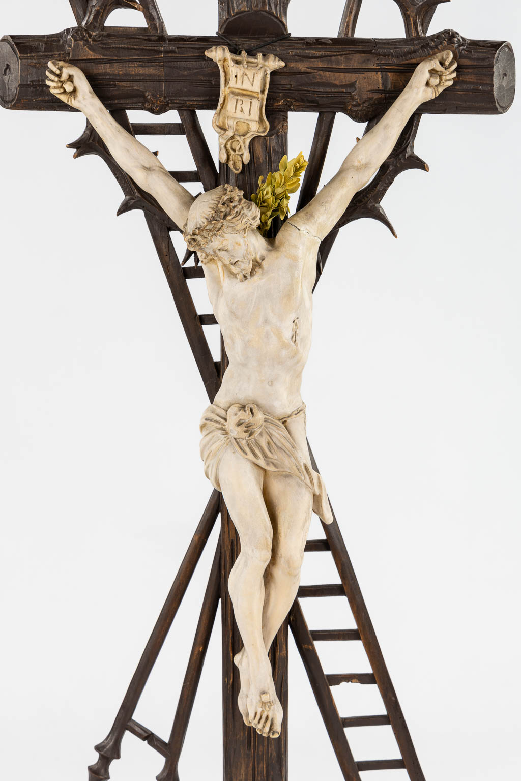 Three large crucifixes, sculptured wood and plaster. (W:46 x H:115 cm)