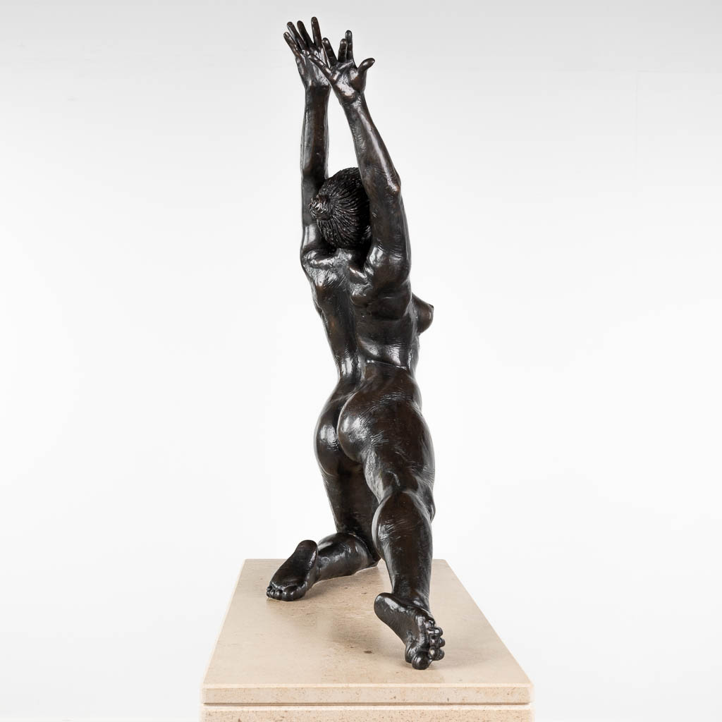 Irénée DURIEZ (1950) 'Femme' patinated bronze on a travertine base (D:20 x W:62 x H:73 cm)