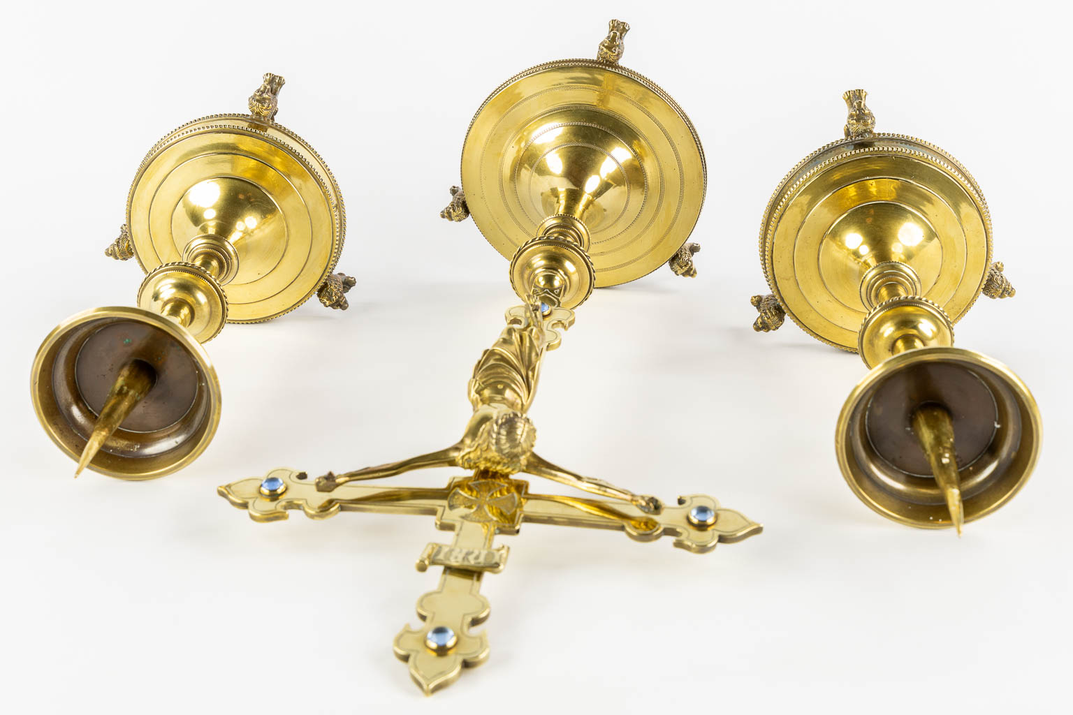 An altar crucifix and matching candelabra, Brass, Gothic revival, probably made by Bourdon, Ghent. (L:21 x W:27,5 x H:57,5 cm)