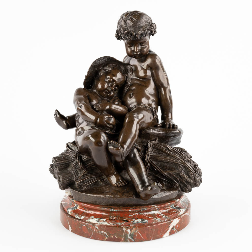 Two Putti 'Resting after The Harvest' patinated bronze. Probably made by Pigalle (H:36 x D:24 cm)