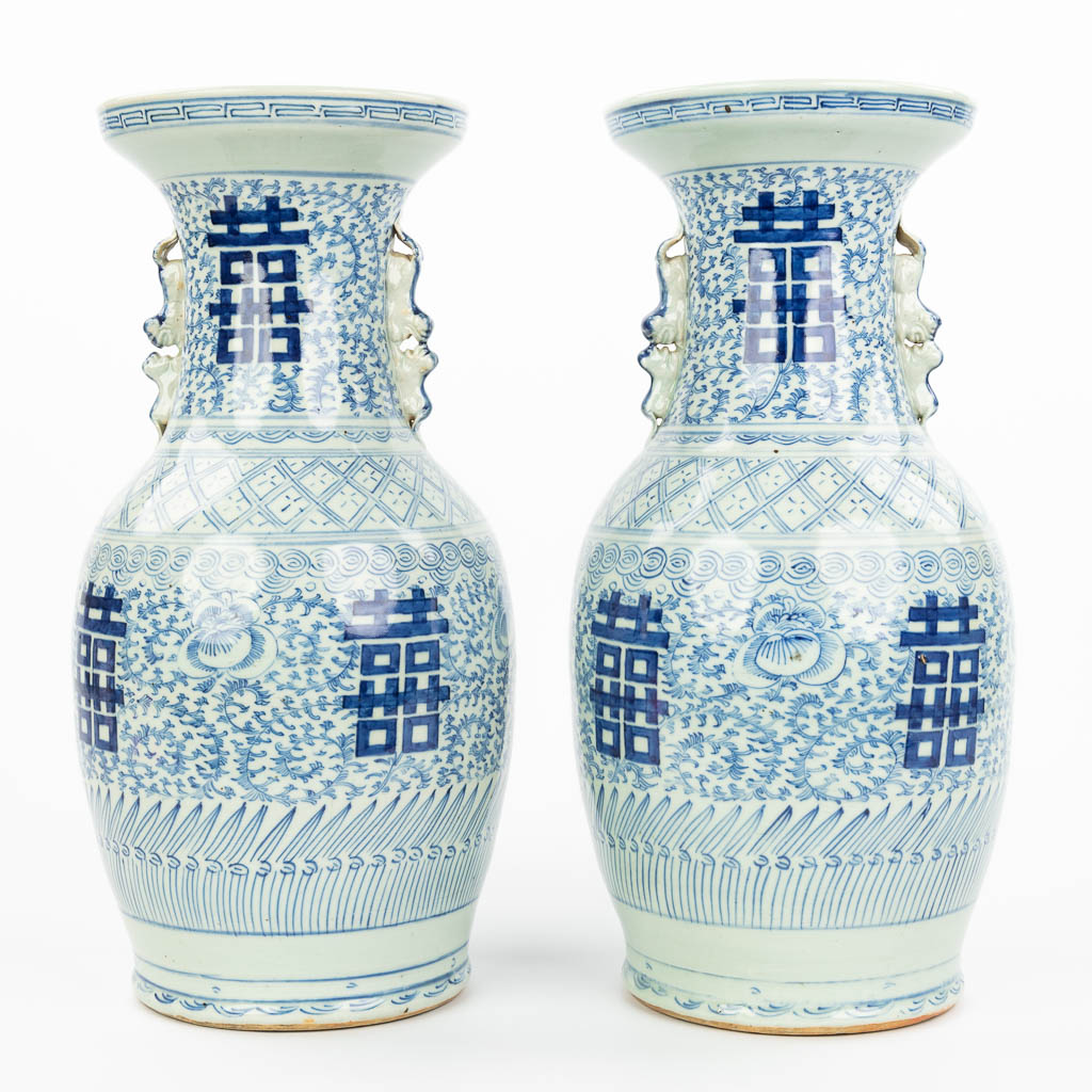 A pair of Chinese vases with blue-white decor and double Xi signs of happiness. (H:44cm)