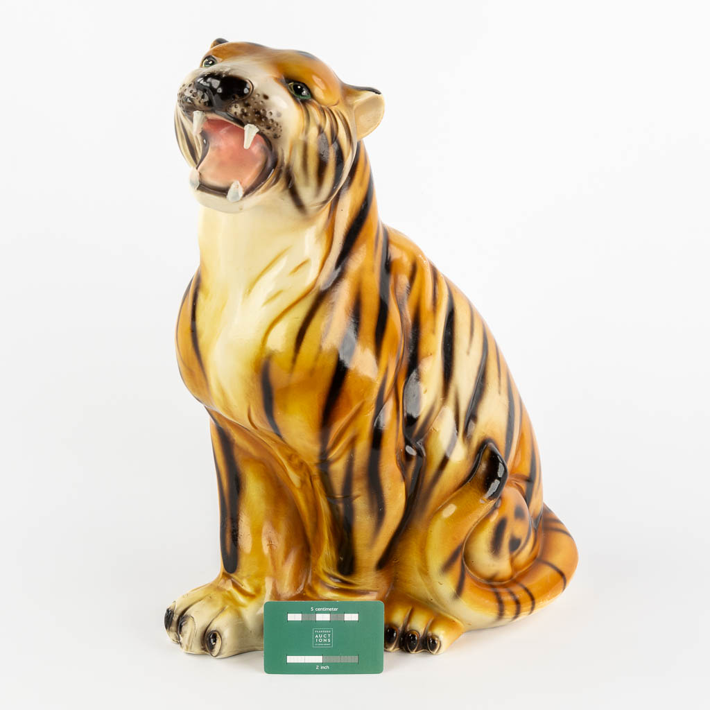A small figurine of a tiger, glazed ceramics. Italy. (L:18 x W:32 x H:45 cm)