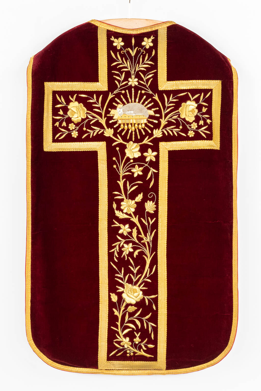 Two Roman Chasubles and stola, red fabric with thick gold thread embroideries.