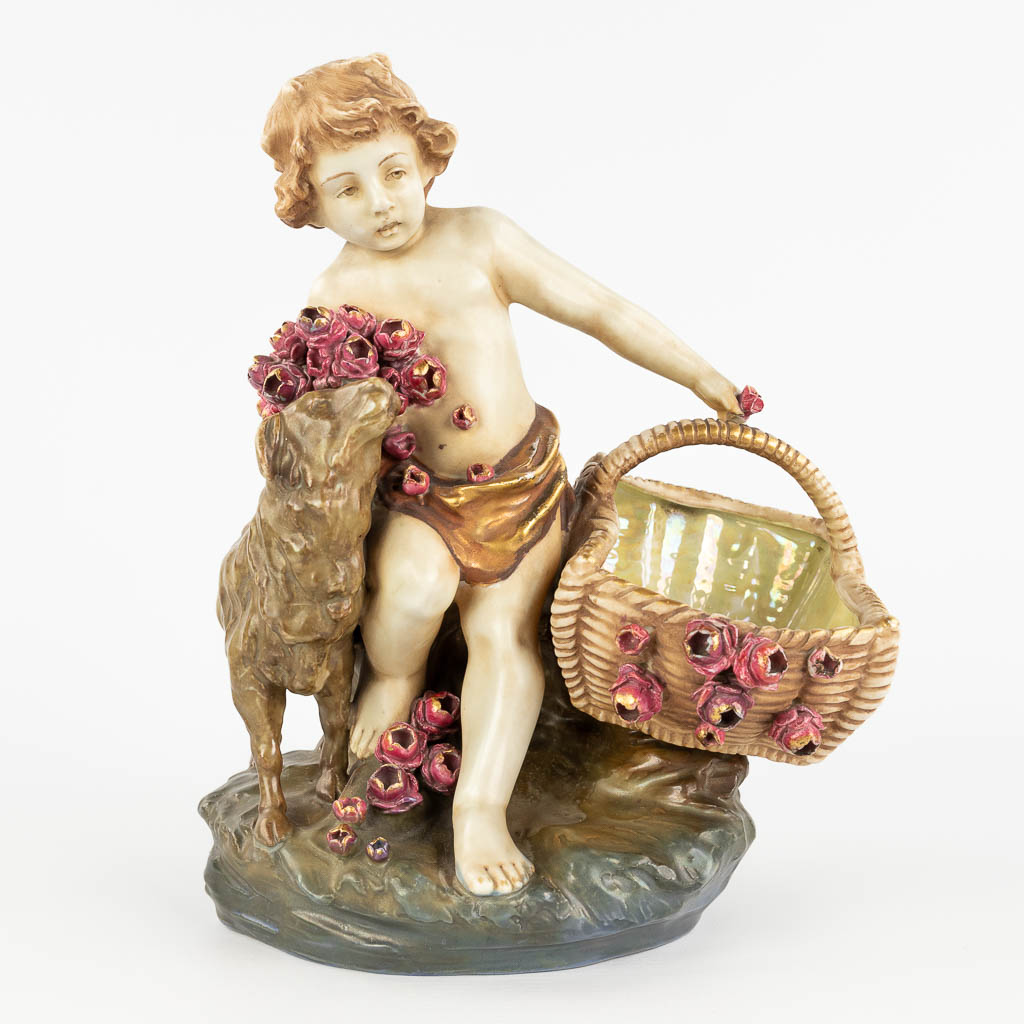  Amphora Austria, 'Child with a basket and sheep' made of glazed faience. 