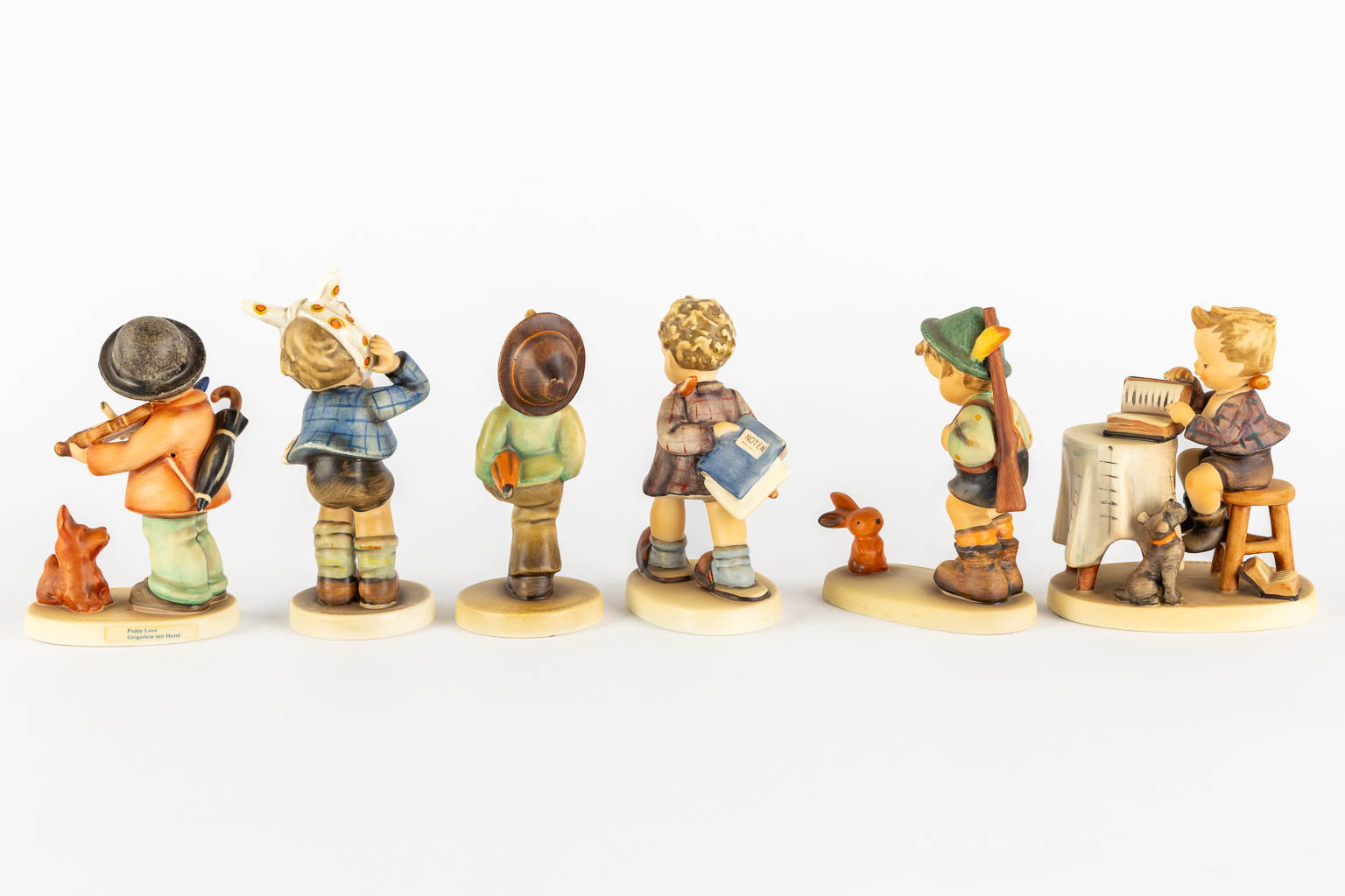 Hummel, 12 figurines, polychrome porcelain. (H:16 cm)