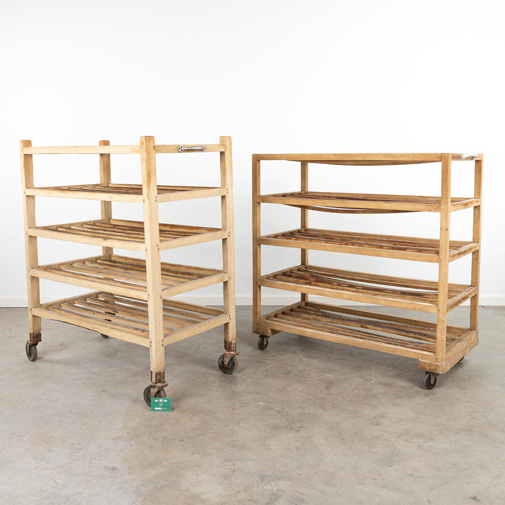 A set of 2 bakers carts, made of wood. (H:117cm)