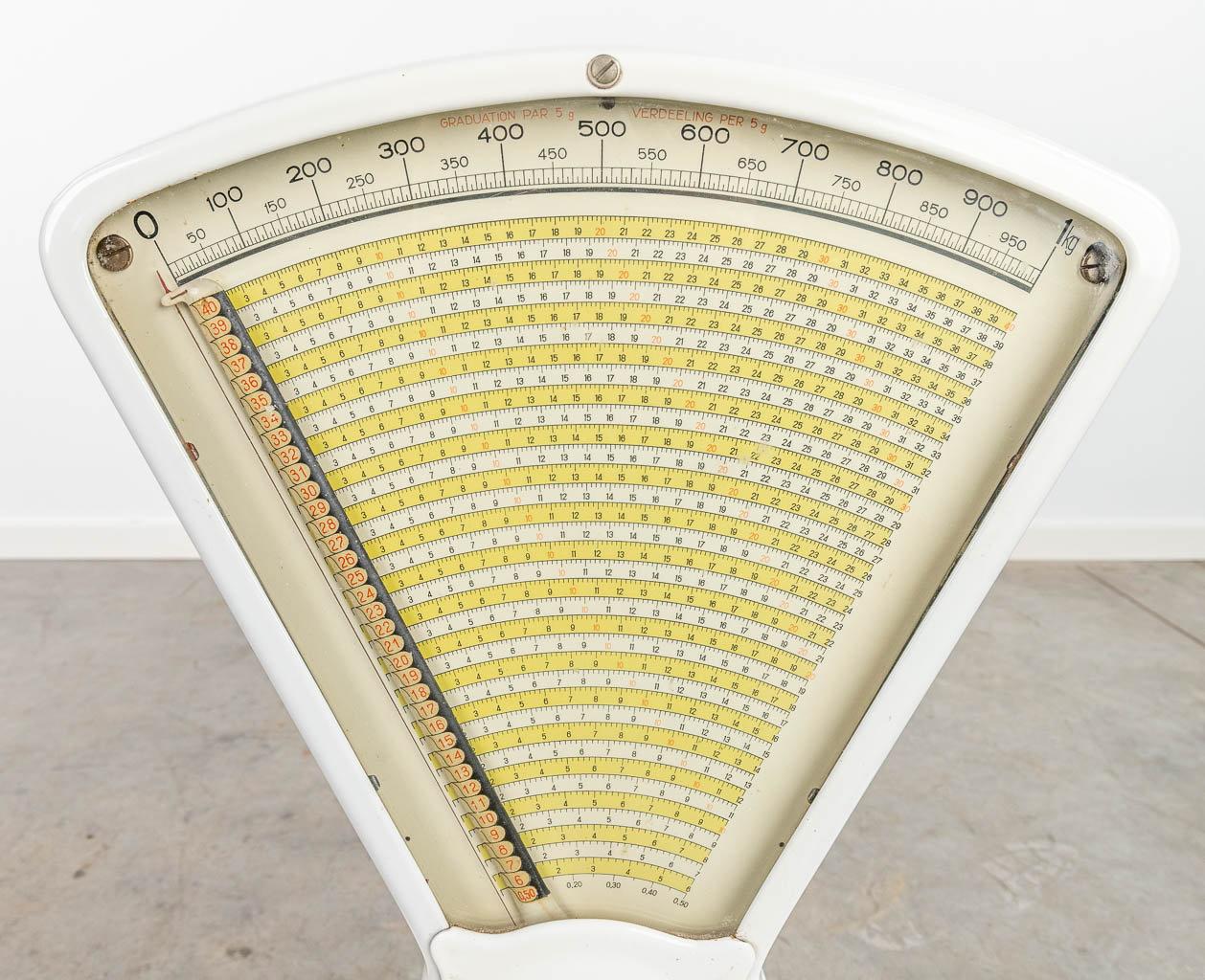A scale with white enamel and additional weights, made by Berkel. (H:68cm)