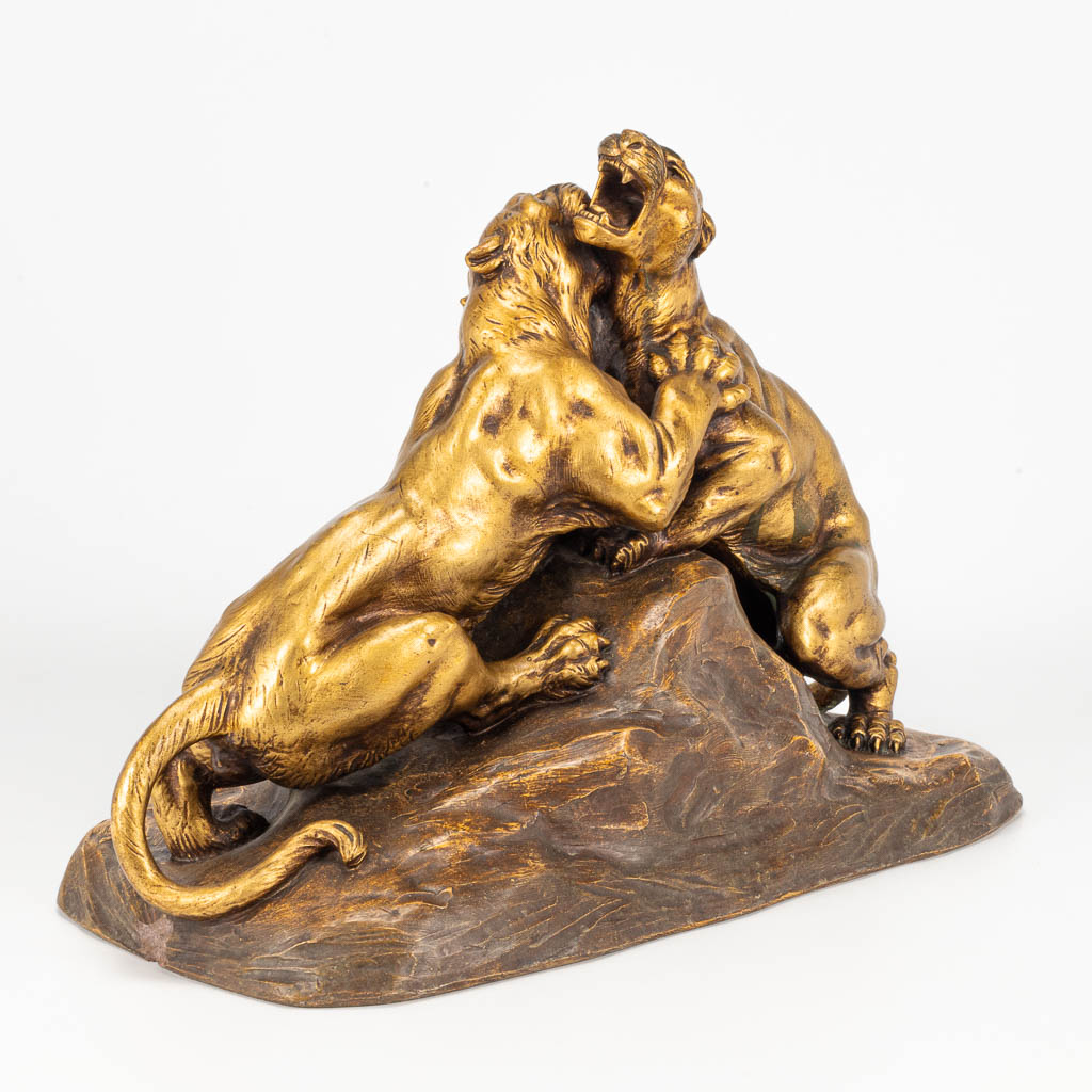 FAGOTTO (XIX-XX) een beeld gemaakt uit terracotta van 2 leeuwinnen. 